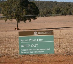 2013 Karnet Prison Farm Inspection view of a sign on the farm fence line