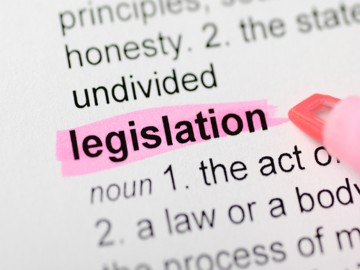 Image of a paper with the word legislation highlighted