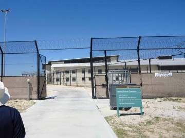 Image of gates separating Hakea Juvenile Facility from adult section of Hakea Prison