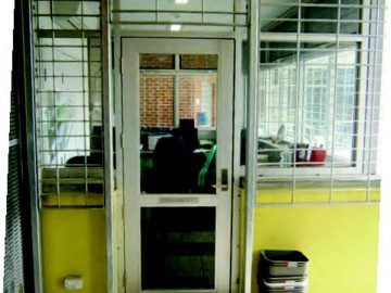 Image of unit office reinforced with security grills