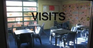 Image of a view through a window into the Visits Room at Rangeview Remand Centre