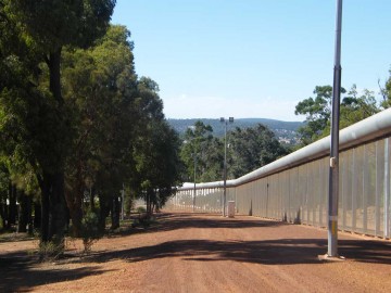 Image of the perimeter fence of Wooroloo Prison Farm