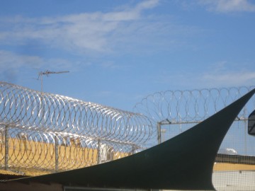 Picture of razor wire over top of shade sails