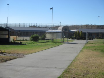 Internal pathway and internal demarcation fence, inside the grounds of Albany Regional Prison