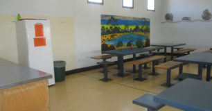 Image of a room with tables and seating for Prisoner's at Acacia Prison