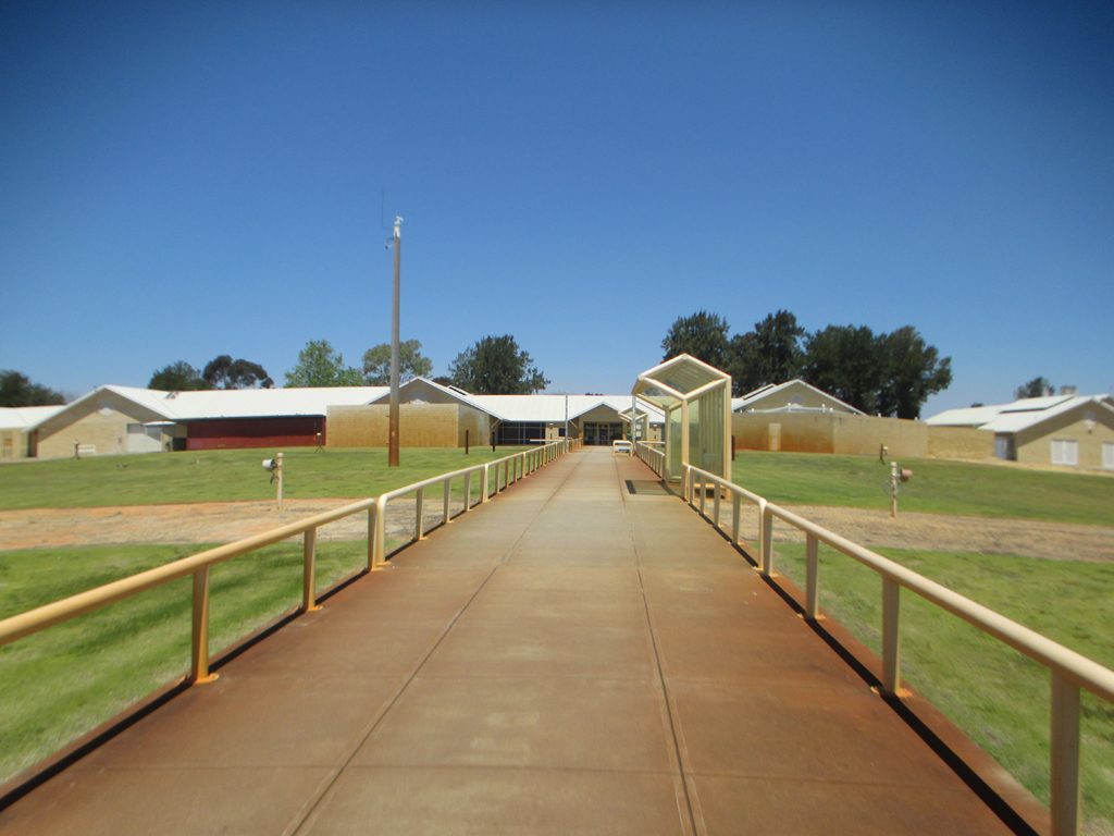 Image of entry path leading to reception at Casuarina Prison
