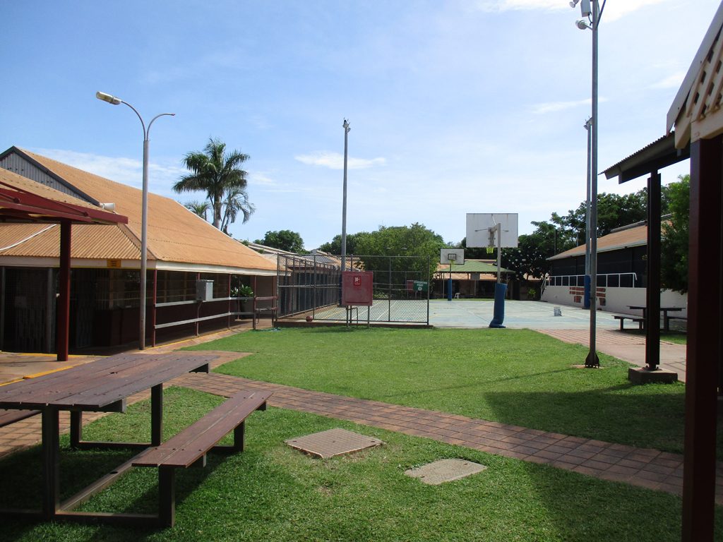 Image of seating and basket ball court in the grounds at Broome Regional Prison