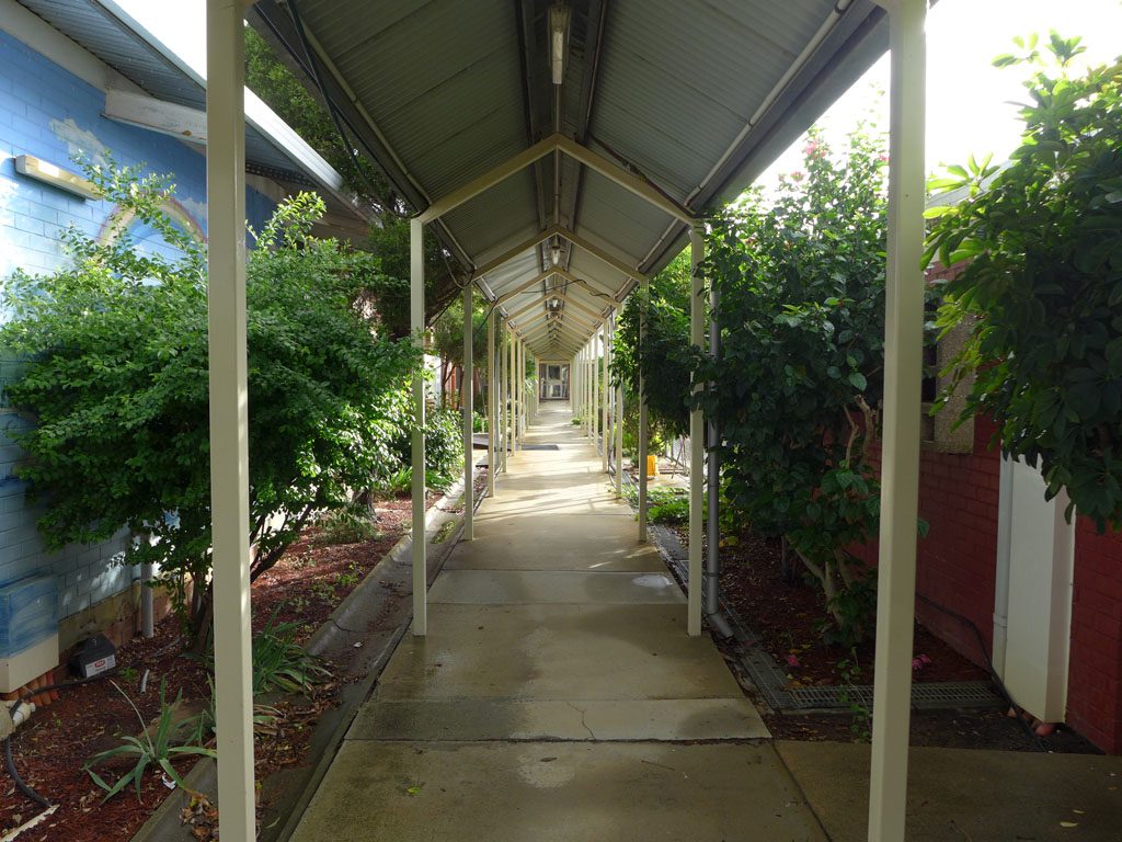 Covered walkway behind unit 1 at Bandyup Women's Prison