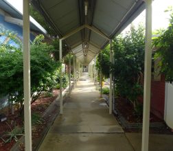 Covered walkway behind unit 1 at Bandyup Women's Prison