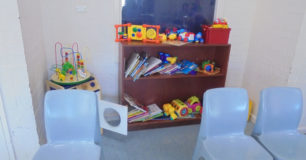 Image of toys and chairs in the children's play area at the visits centre