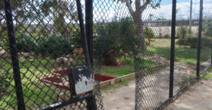 Image of the breached fence in Unit 4