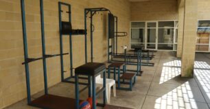 Image of gym equipment in the SHU courtyard at Casuarina Prison