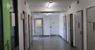 Image of corridor with doors to the video link pods at Casuarina Prison