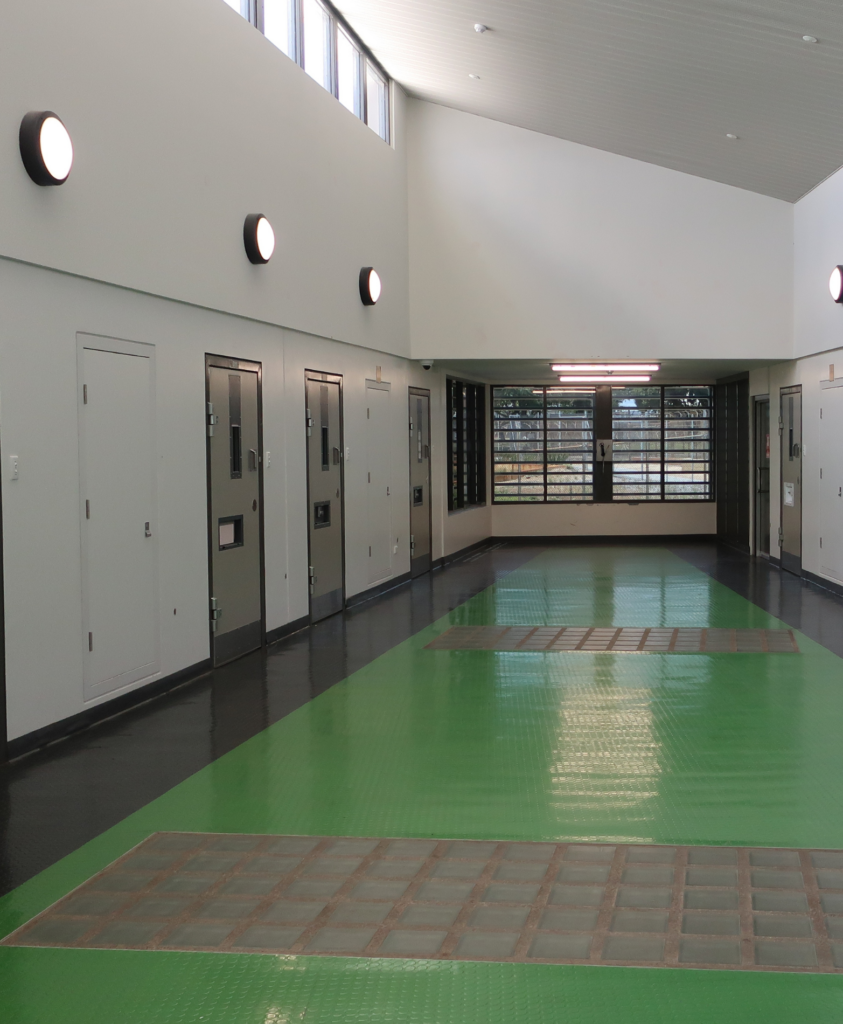 A photo of a wing corridor in Unit 18 at Casuarina Prison.