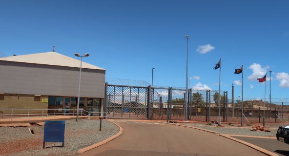 A photo of the front gate at Roebourne Regional Prison.