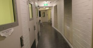 Image of a corridor of holding cells at the Perth Children's Courthouse