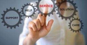 Image of a person pressing the word 'Service' in a series of cogs