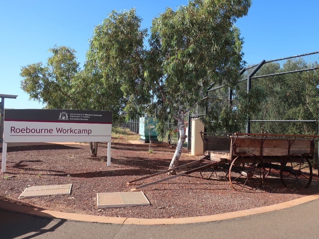 Image of a Roebourne Work Camp sign at the entrance to the work camp